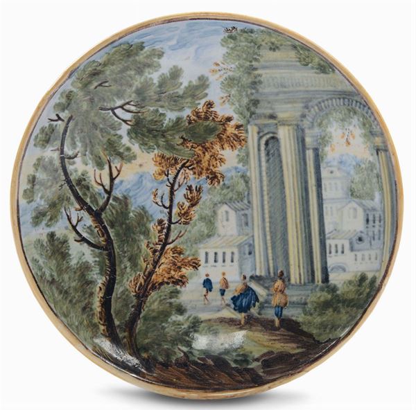 Piattino fondo in maiolica decorato con paesaggio e architetture, Castelli XVIII secolo