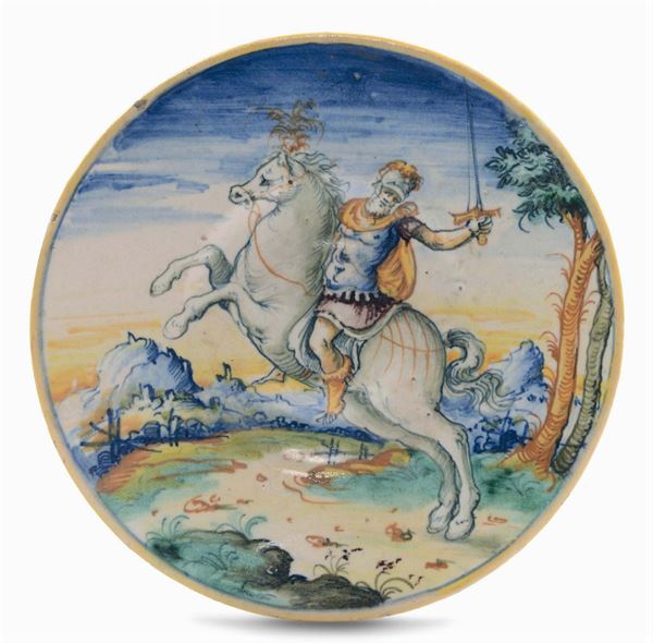 Tagliere in maiolica istoriata raffigurante condottiero a cavallo, forse il mito del Capitano Battistone Castellini, Faenza XVI secolo (forse imitazione XIX secolo)