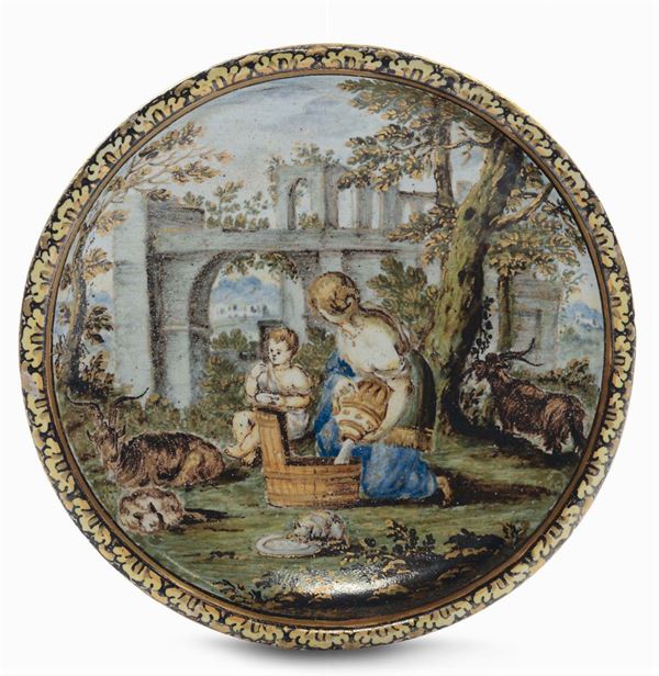 Piattino in maiolica decorato con scena bucolica e dorature, Castelli XVIII secolo
