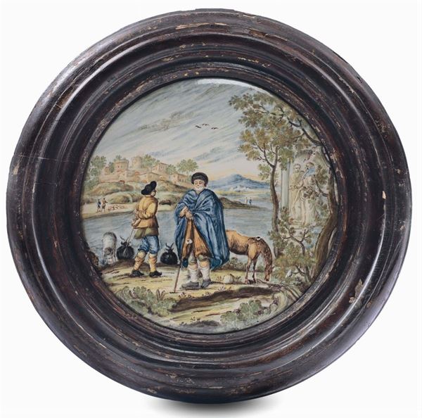 Disco in maiolica raffigurante pastori in riva al fiume, Castelli XVIII secolo