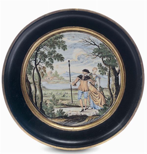 Disco in maiolica raffigurante figure entro paesaggio, Castelli XVIII secolo