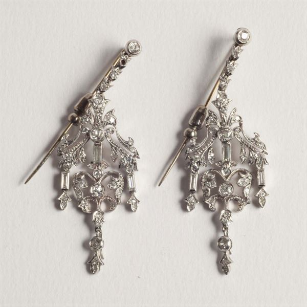 A pair of diamond pendent earrings. By Furst, Rome