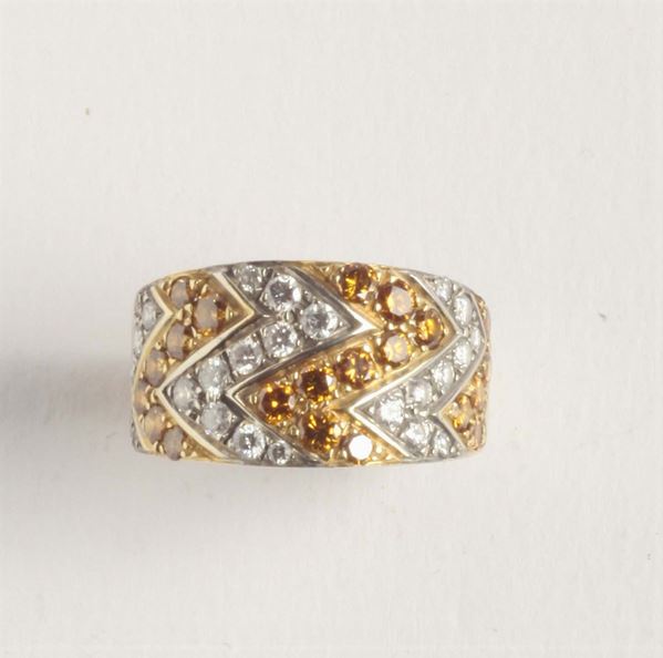 A white and yellow diamond band ring