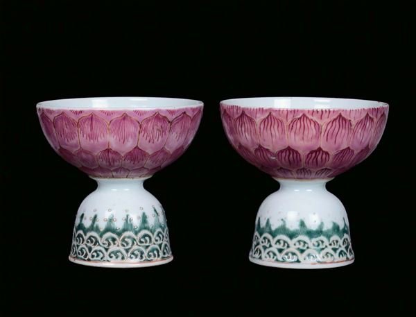 Two polychrome porcelain cups, China, Qing Dynasty, 19th centuryRelief decoration with lotus leaves