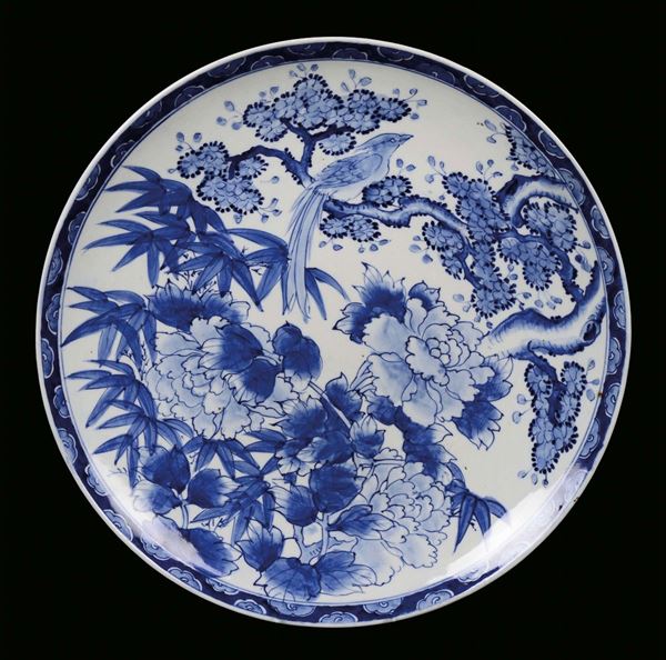 A porcelain dish with trees and phoenix, Japan 20th century