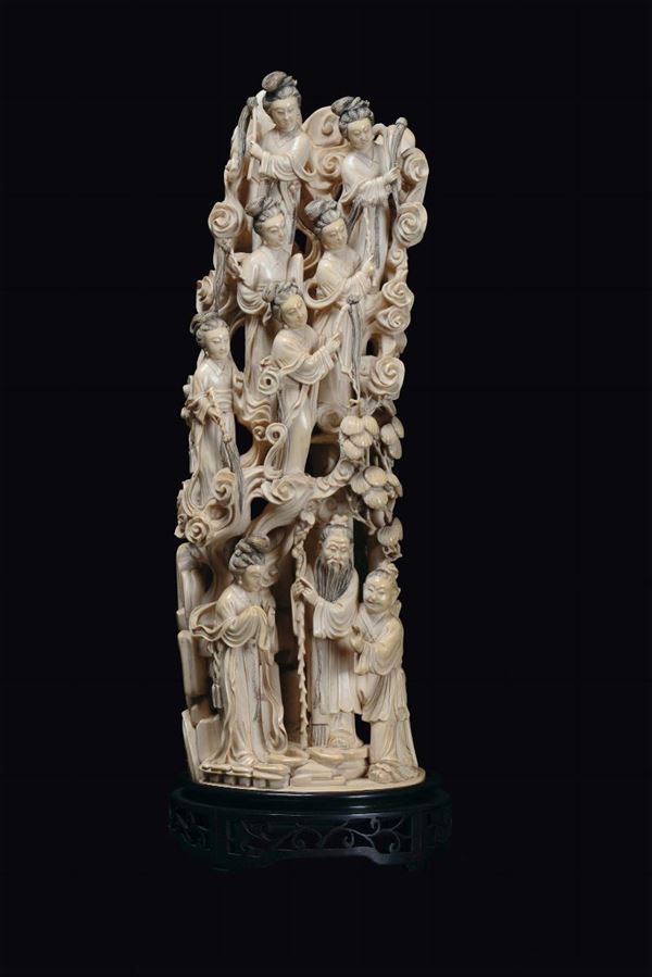 A carved ivory “ life tree and figures” group, China, Qing Dynasty, late 19th century