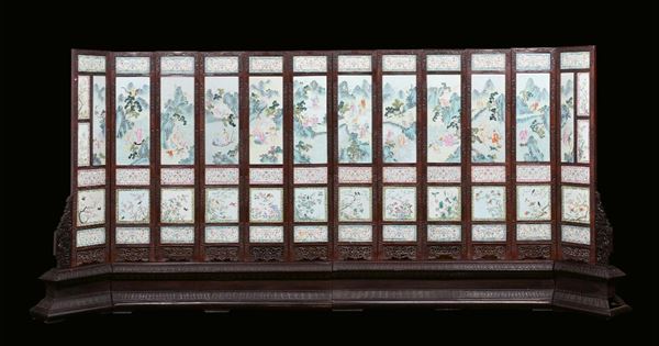 An important 12-shutter Homu wood screen and 64 polychrome porcelain plaques, China, Qing Dynasty, Jiaqing  [..]