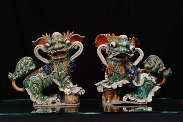 A pair of polychrome enamelled porcelain Pho dogs