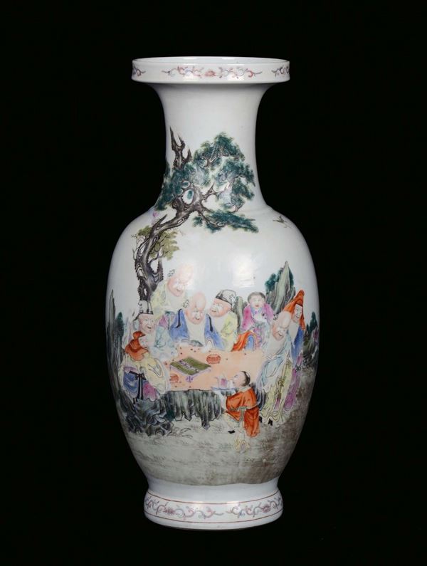 A porcelain vase, Famille Rose, China, Qing Dynasty, 19th centuryPolychrome decoration with people, apocryphal Qianlong mark