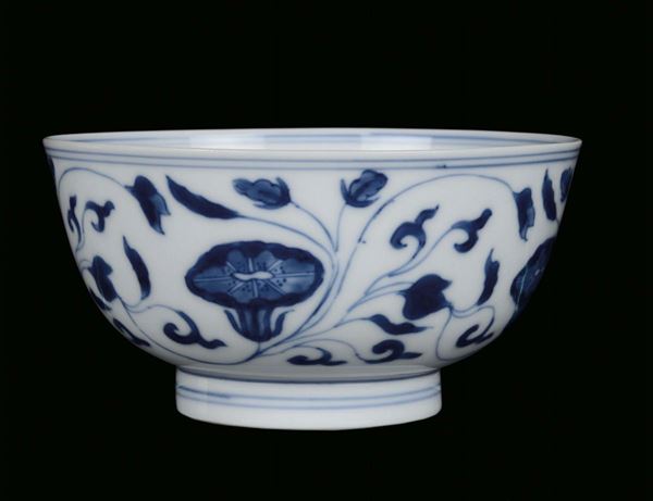 A small white and blue porcelain bowl with naturalistic decoration, China, Qing Dynasty, Kangxi Period (1662-1722)