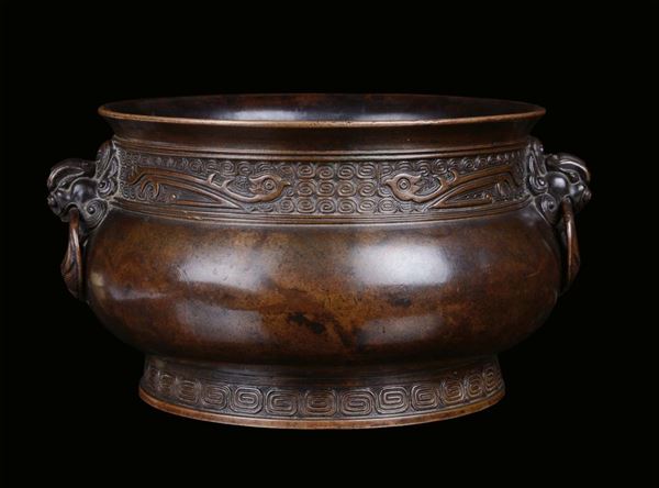 A bronze censer, archaic shape, China, Qing Dynasty, 18th centuryHandles in the shape of relief animal heads and rings, Xuande mark