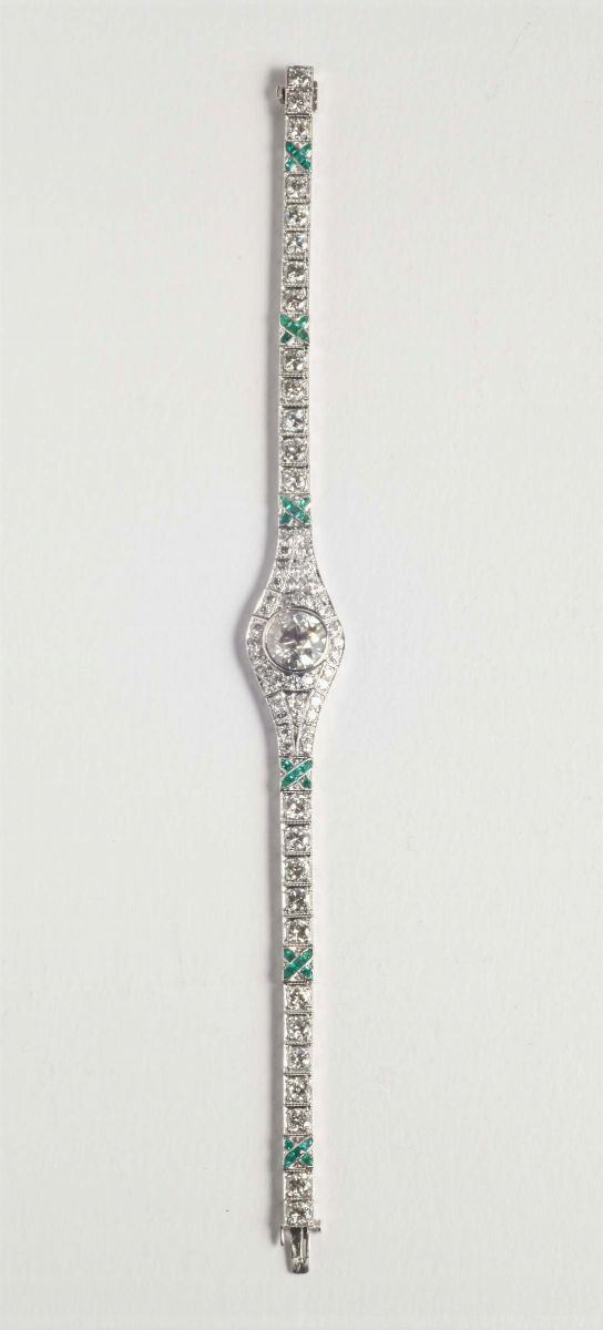An Art Deco style diamond and emerald bracelet
