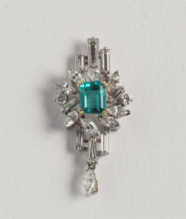 A step-cut emerald and diamond pendant