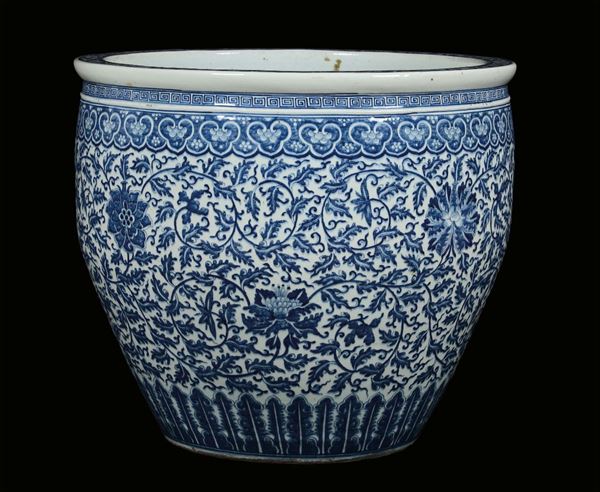 A large white and blue porcelain cachepot with plant forms decoration, China, Qing Dynasty, 19th century