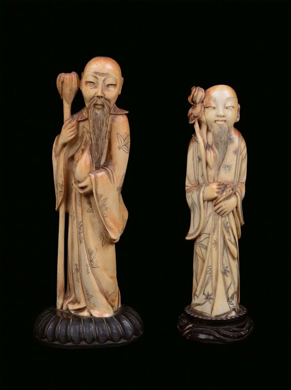 Due dignitari in avorio scolpito, Cina XIX secolo