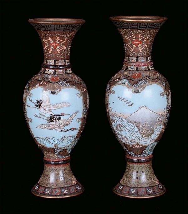 A pair of polychrome enamel vases, Japan, 19th century