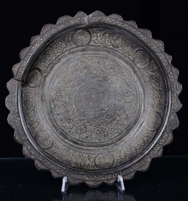 A decorated bronze dish , China, 20th century