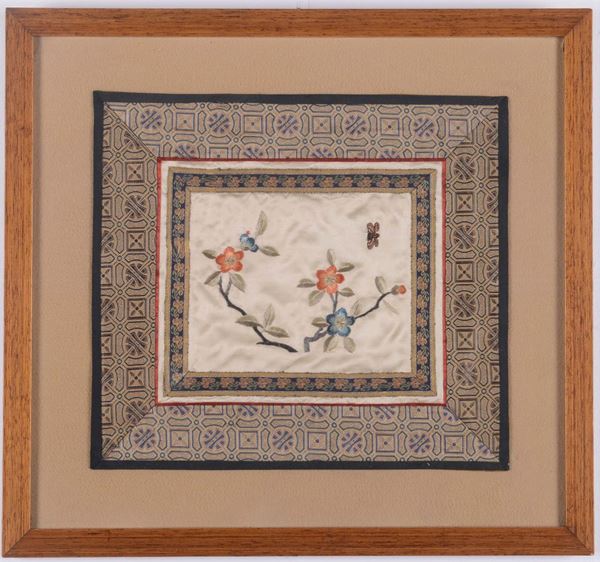A silk drape embroidered with lotus flowers