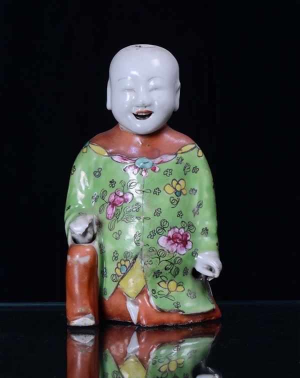 A figure of Magot, polychrome porcelain