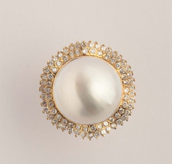 A mabé pearl and diamond cluster ring