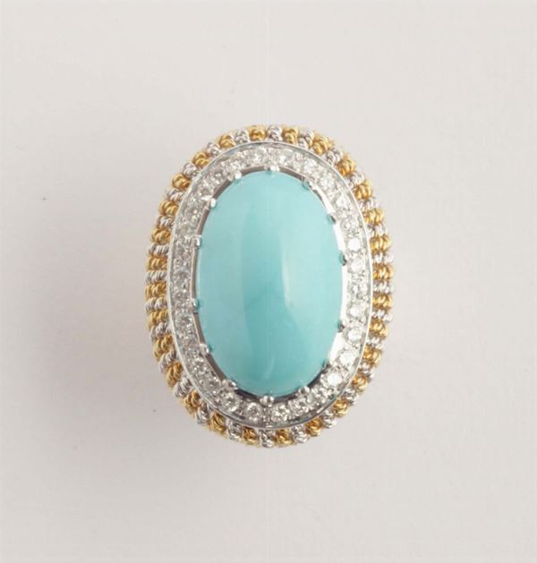 A cabochon turquoise and diamond cluster ring