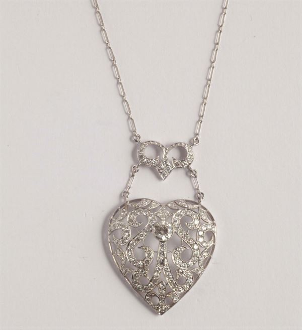 An heart openwork diamond-set pendant
