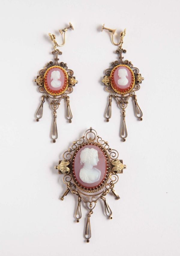 A cameos brooch and pair of earrings suite