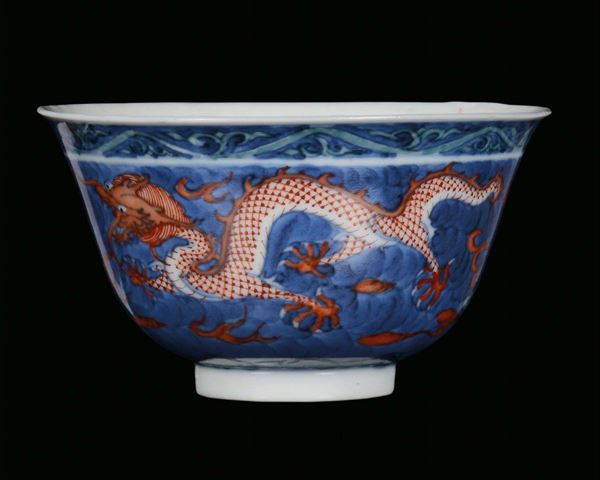 A small Ducai porcelain bowl with dragons, China, Qing Dynasty , 19th century Apocryphal Kangxi mark
