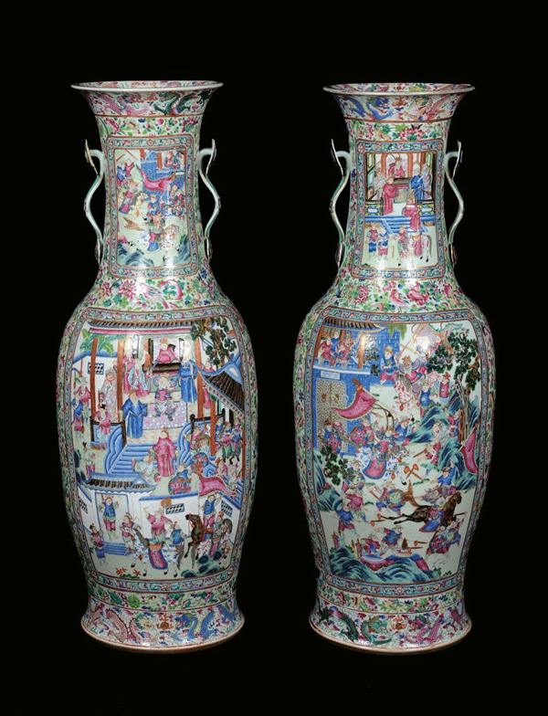 A pair of large and rare monumental polychrome porcelain vases, Famille Rose, China, Qing Dynasty, 19th centuryHandles in the shape of ruji, floral decoration with dragons, court life scenes and battles within reserves