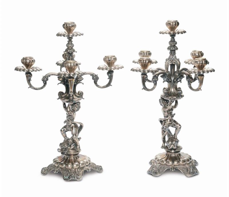 Coppia di candelabri in argento fuso a cinque luci  - Asta Argenti e Gioielli Antichi e Contemporanei - Cambi Casa d'Aste