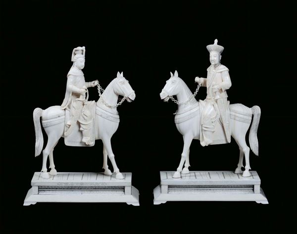 A pair of sculpted ivory dignitaries on horse, China 20th century