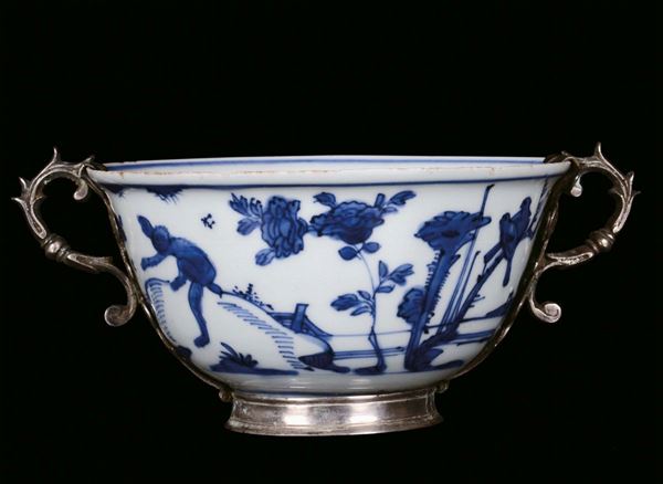 A white and blue porcelain bowl with landscape and figures, China, Ming Dynasty, Wanli Period (1573-1620)coeval European setting in silver, mark and the Period