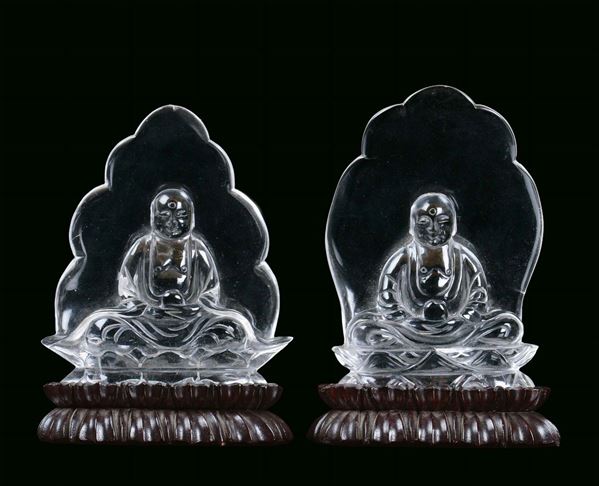 A pair of rock crystal Buddha, China, Qing Dynasty, 20th century