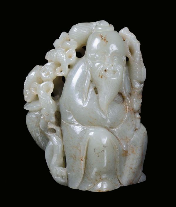A Celadon jade sitting luohai, China, Qing Dynasty, 19th century