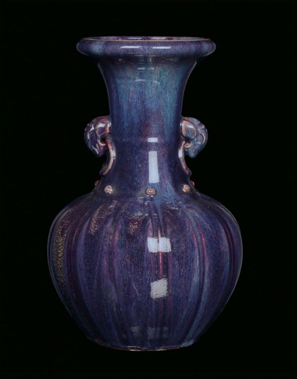 A flambé ceramic vase in the shape of a pumpkin, China, Qing Dynasty, 19th century
