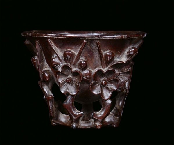 A wood libation cup sculpted and fretworked with floral motives, China, Qing Dynasty,  18th century