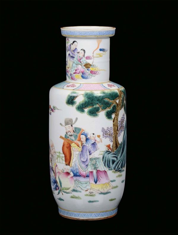 A polychrome porcelain rouleau vase decorated with figures, China, Qing Dynasty, 19th century