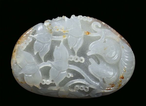 A small white and russet jade decorated with birds, China, Qing Dynasty, 19th century