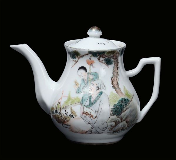 A small polychrome porcelain teapot with figures and ideograms, China, Republic, 20th century mark