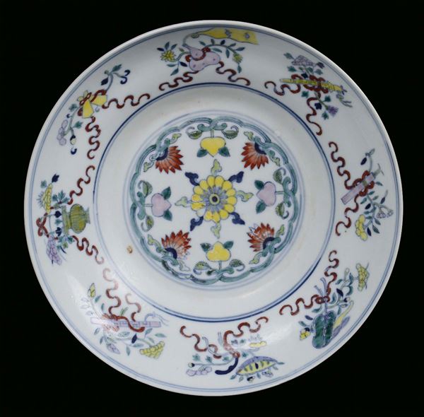 A small Ducai porcelain plate with floral decoration, China, Qing Dynasty, Guangxu Period (1875-1908) Mark and the period