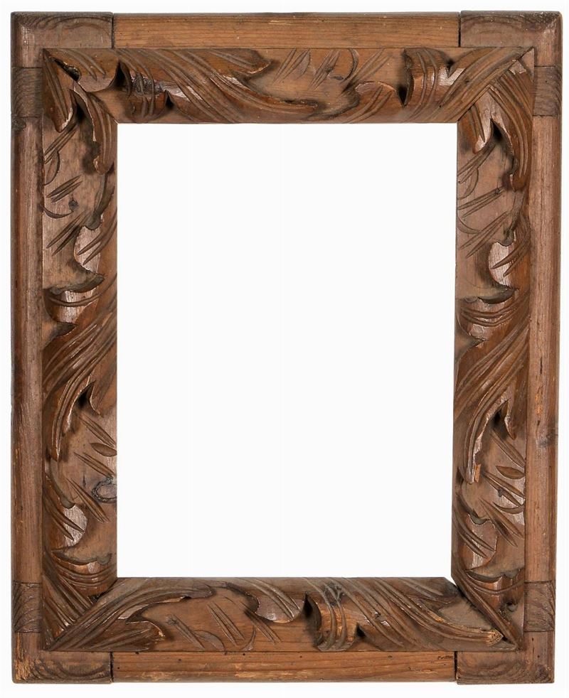 Cornicetta in legno naturale intagliata a motivo vegetale, XVIII secolo  - Auction Antique Frames from 16th to 19th century - Cambi Casa d'Aste