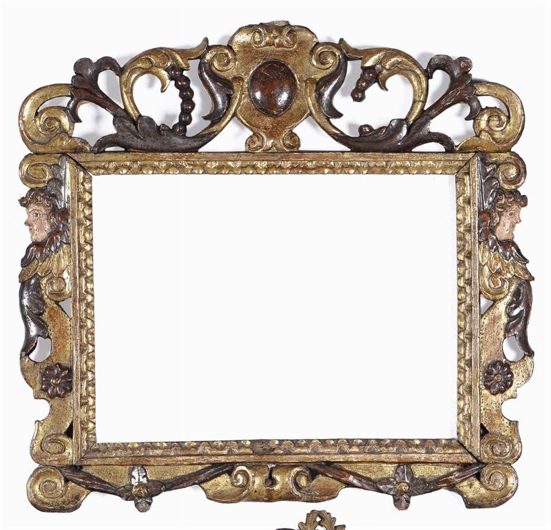 Cornice laccata, dorata ed intagliata a traforo, XVII secolo  - Auction Antique Frames from 16th to 19th century - Cambi Casa d'Aste