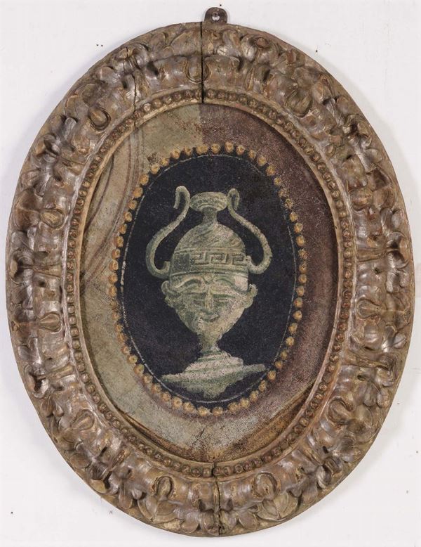 Cornice ovale intagliata e argentata, XVIII secolo