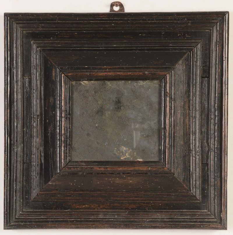 Cornice da reliquie ebanizzata montata a specchio, XVII secolo  - Auction Antique Frames from 16th to 19th century - Cambi Casa d'Aste