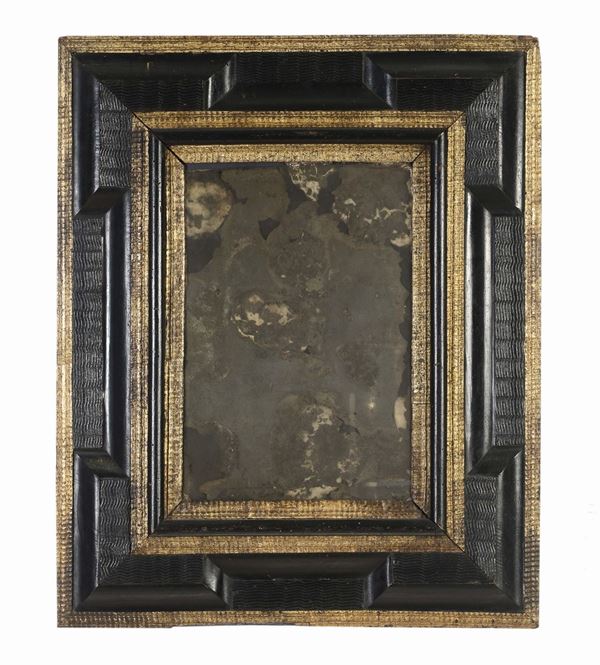 Cornice guillochè nera e oro, XVII secolo
