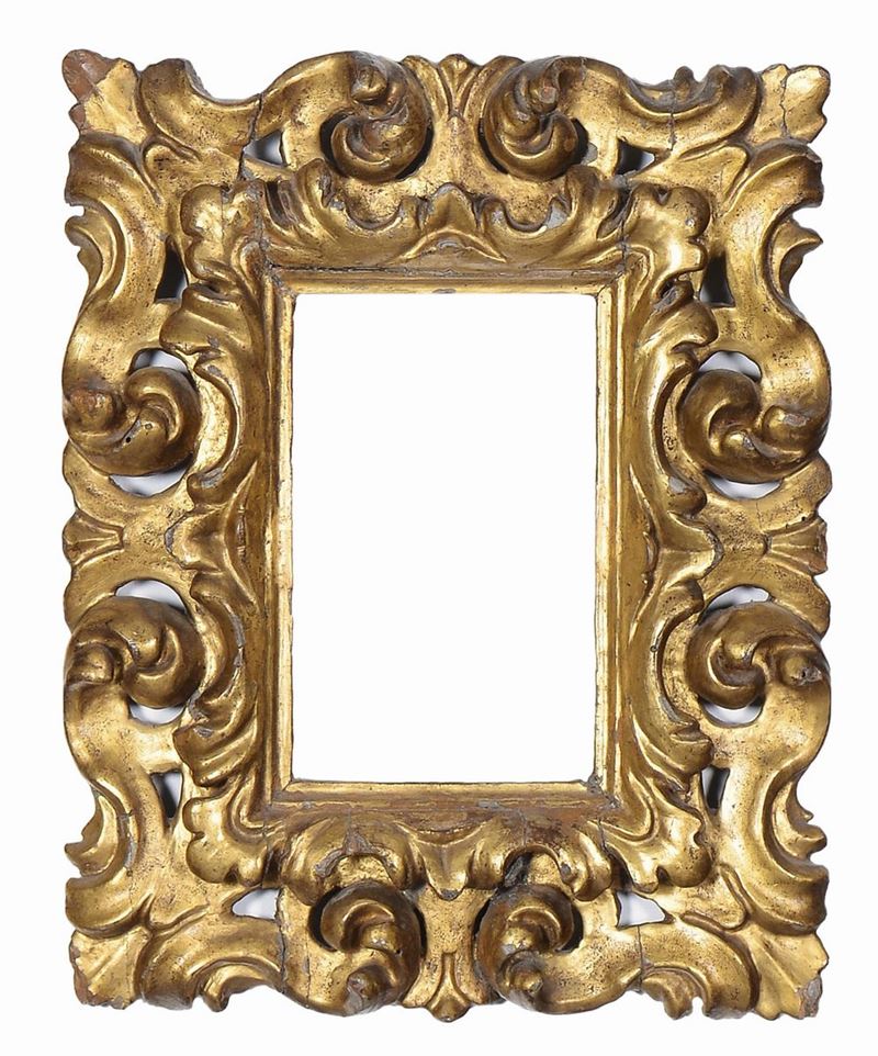 Piccola cornice intagliata e dorata. XVII secolo  - Auction Antique Frames from 16th to 19th century - Cambi Casa d'Aste