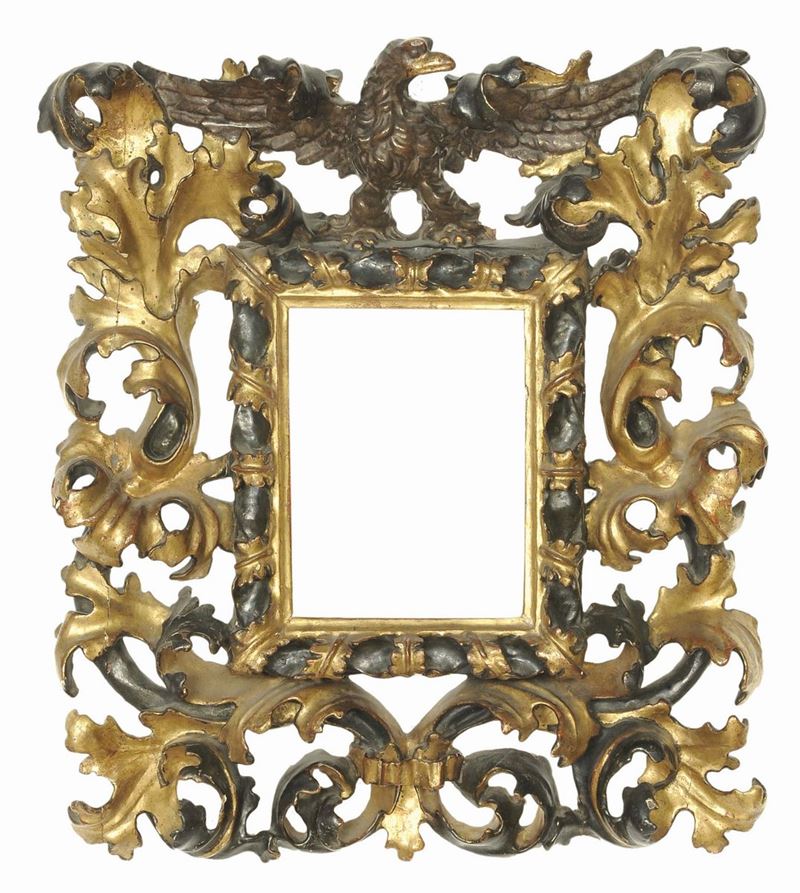 Rara cornice riccamente intagliata, laccata e dorata, Emilia XVII secolo  - Auction Antique Frames from 16th to 19th century - Cambi Casa d'Aste
