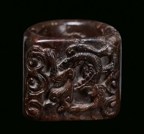 A jade ring with sculpted dragon, China, Qing Dynasty, 19th century