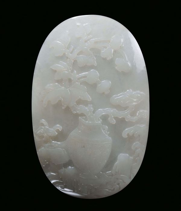 A white jade plate decorated with a vase of flowers, China, Qing Dynasty, 18th century
