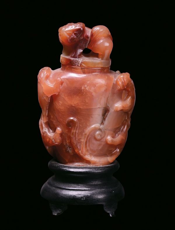 A small carnelian vase with Pho dog, China, Qing Dynasty,  19th century